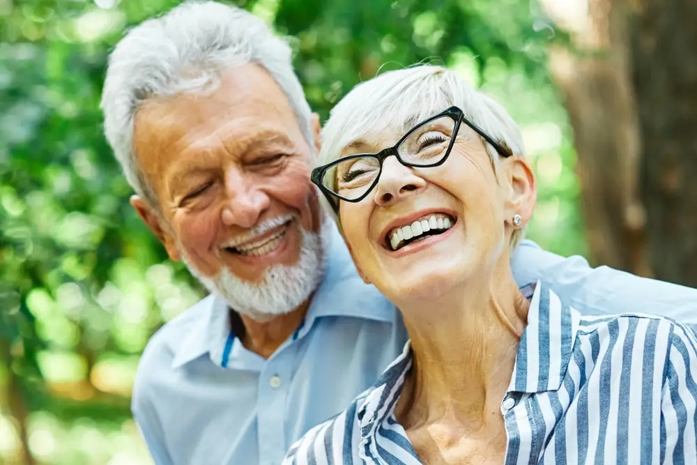 Laughing senior couple outdoors