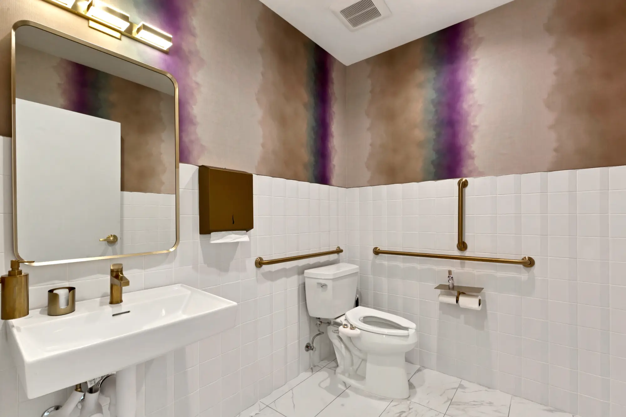 Restroom sink, mirror and grab bars