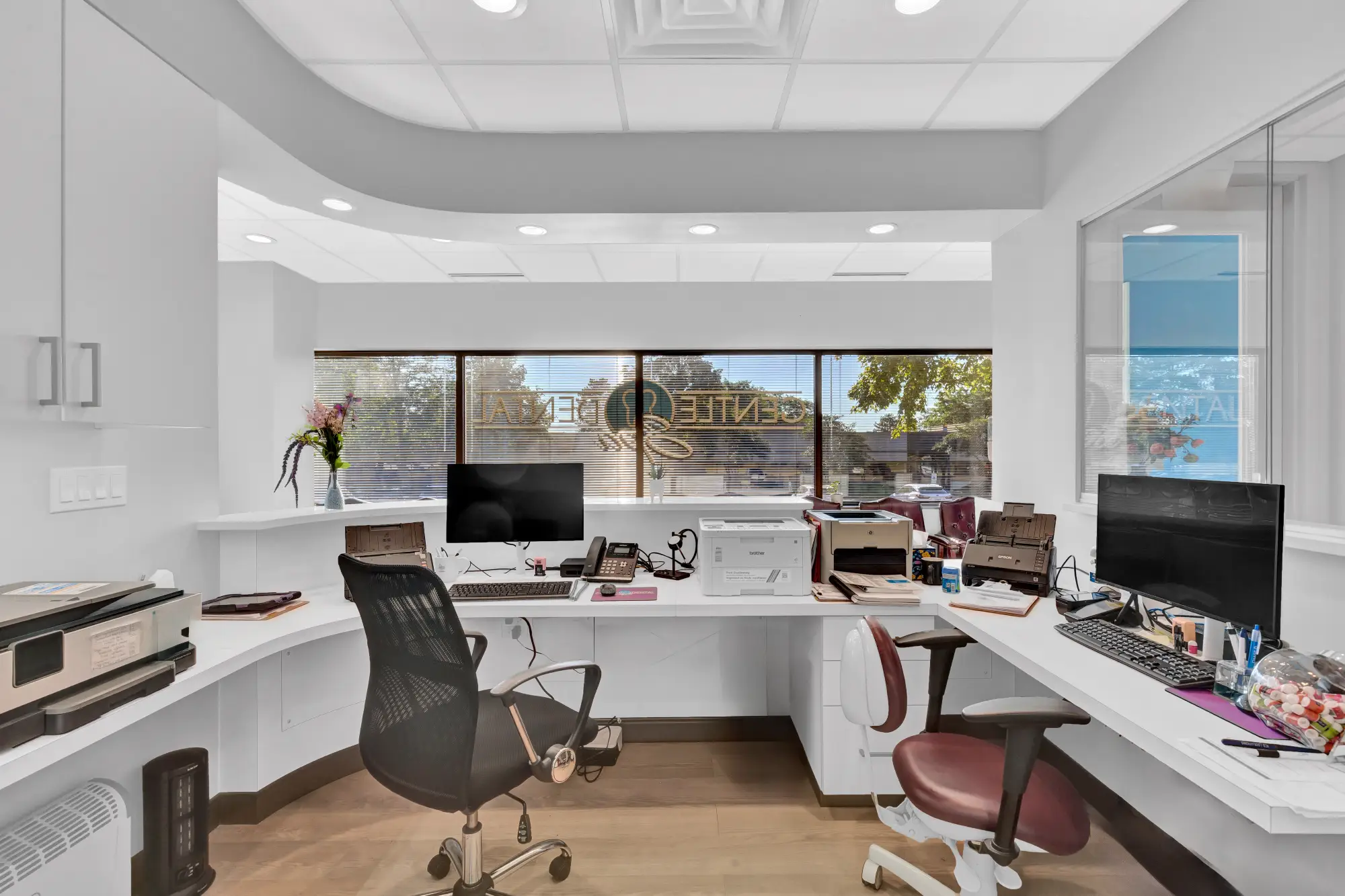 Front office workstations behind the reception desk