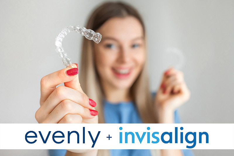 Smiling woman holding Invisalign aligners, with the Evenly + Invisalign logo